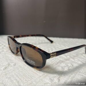 Miu Miu A06S Sunglasses – Lightly Worn, Excellent Condition